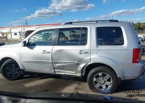 2011 Honda Pilot Touring z USA, uszkodzony, nr VIN 5FNYF4H97BB096791